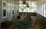 Giant wraparound screen porch on two sides