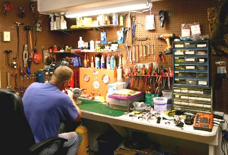 Technician working in our repair shop